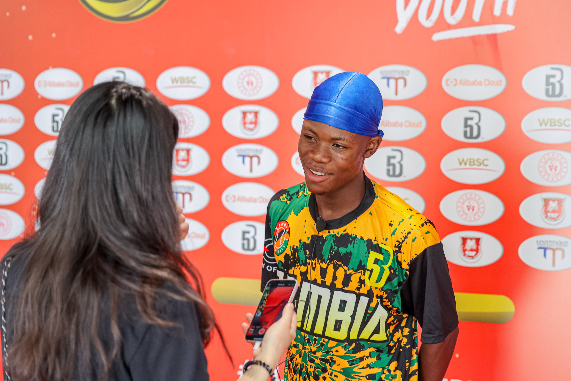 Zambia player David Kalunga doing a post-competition interview