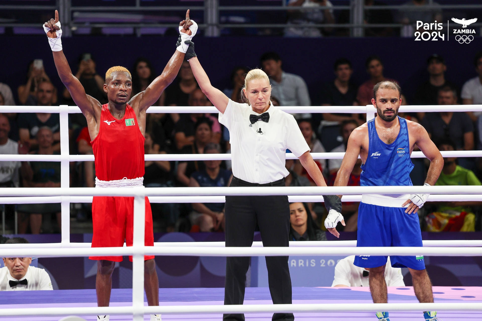 Victory Moment - Boxing triumph at Paris 2024, capturing the pride and achievement of Team Zambia's success